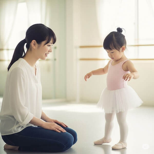 子供の習い事バレエを見守る母親